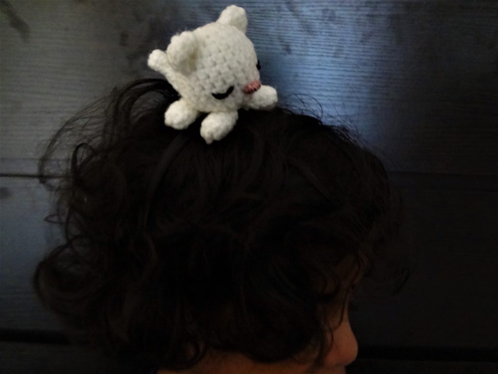Crochet cat headband on a little girl
